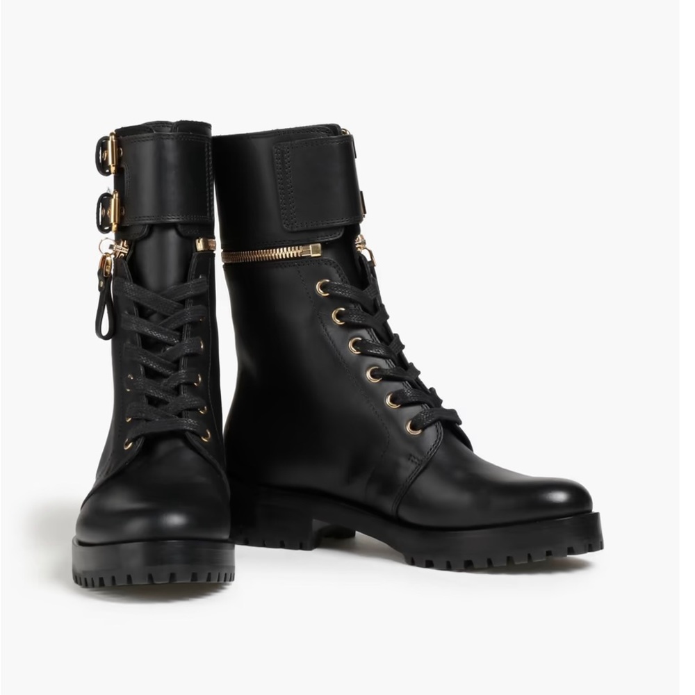 NIB SERGIO ROSSI
Zip-detailed leather combat boots Size 37